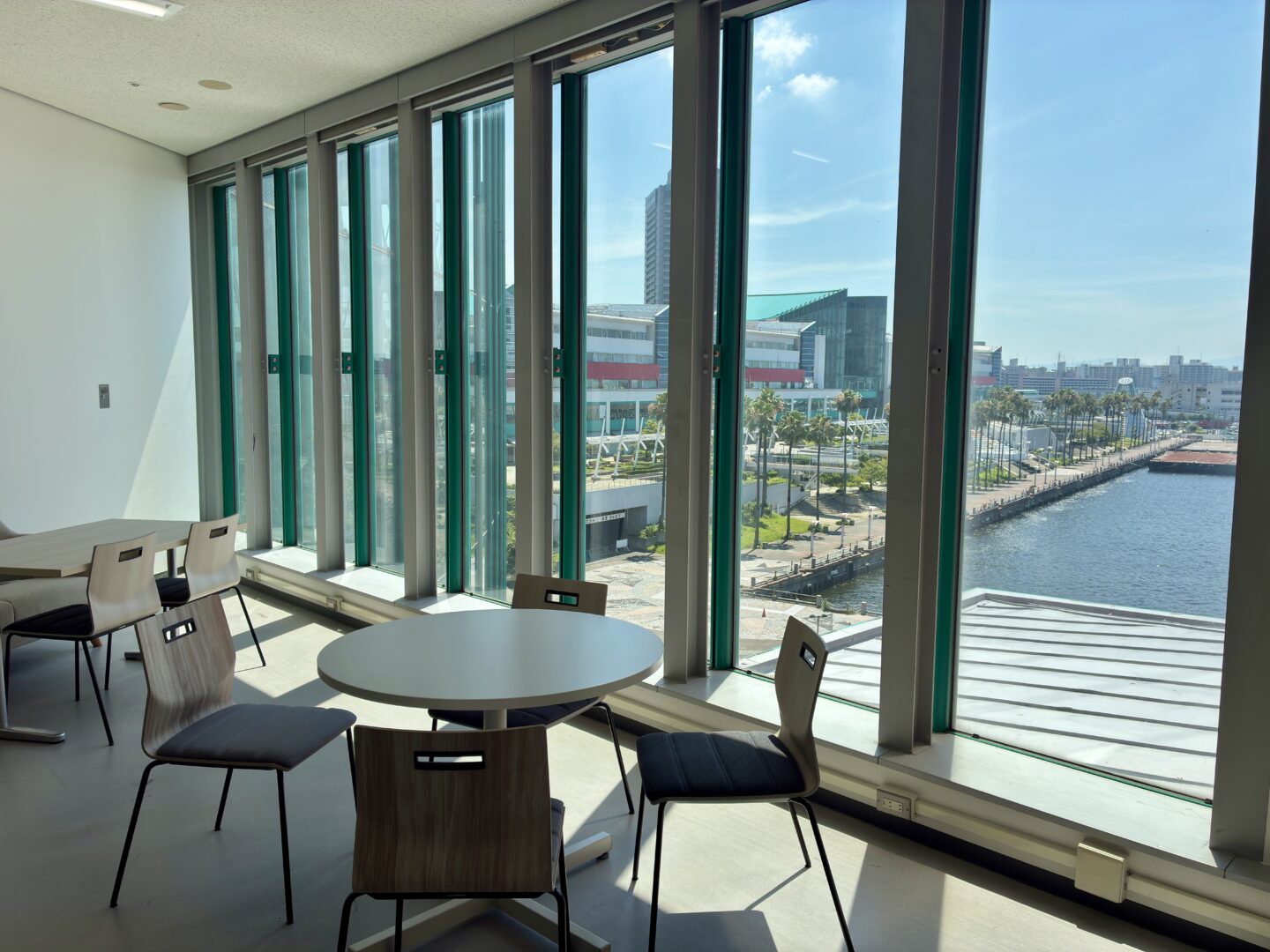 Osaka coworking interior with bright daylight and city view