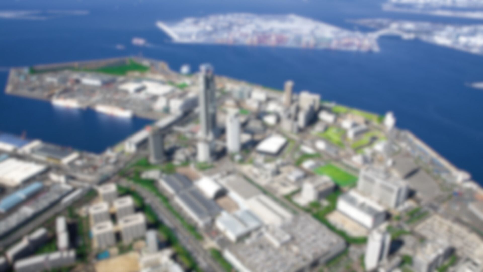 Aerial view of ATC Osaka office complex on Sakishima Island with ITM and O's buildings overlooking Osaka Bay waterfront